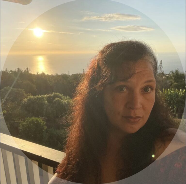 A member of our team enjoys the sunset, reflecting our center's serene and healing environment.