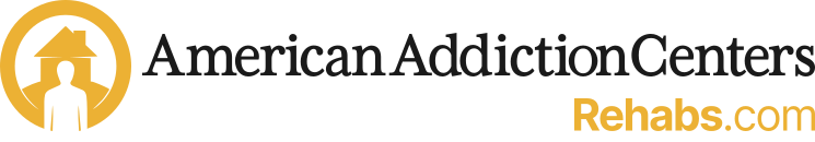 Logo featuring the silhouette of a person and house inside a yellow circle, with text: "American Addiction Centers Rehabs.com".